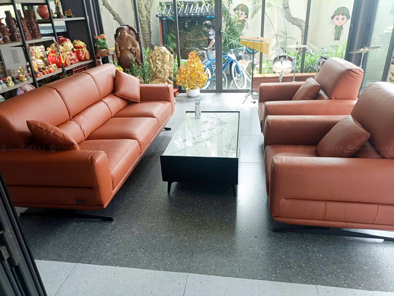 Bộ sofa da bò Genova nhập khẩu nguyên kiện từ Ý màu cam tại nhà khách
